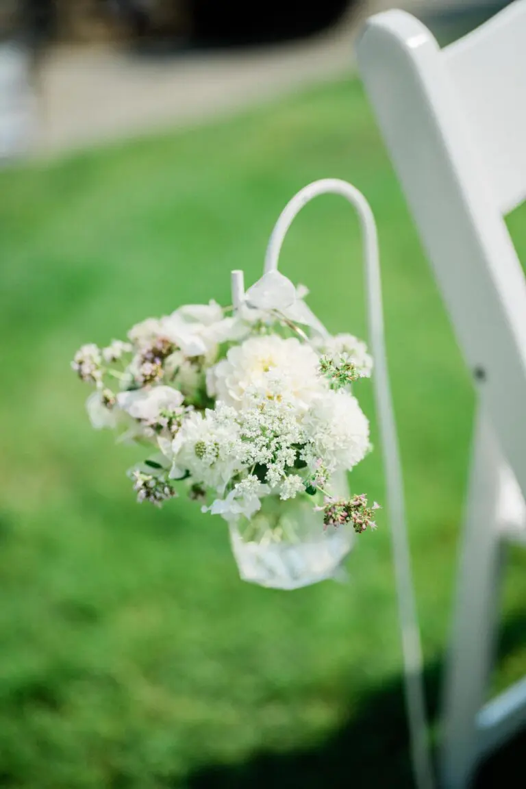 flowers on ceremony seating outside hotel de haro