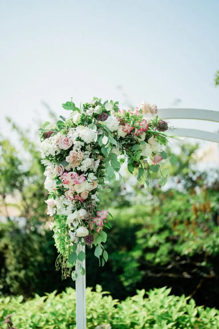 flowers decorate the ceremony arch at Roche Harbor Resort wedding
