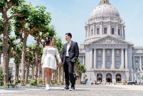 Engagement photo at San Francisco City Hall, one of the 24 Best Places for Engagement Photos in San Francisco, captured by our San Francisco wedding photography & videography team.