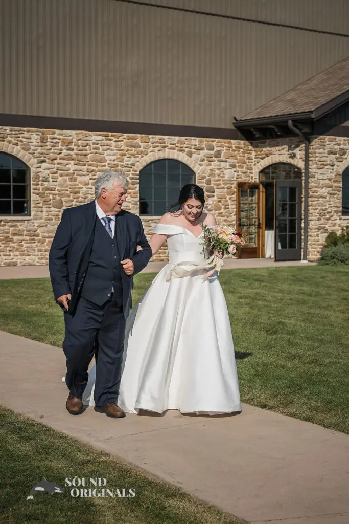 Bridal walk hand in hand with dad at Folino Estate Winery