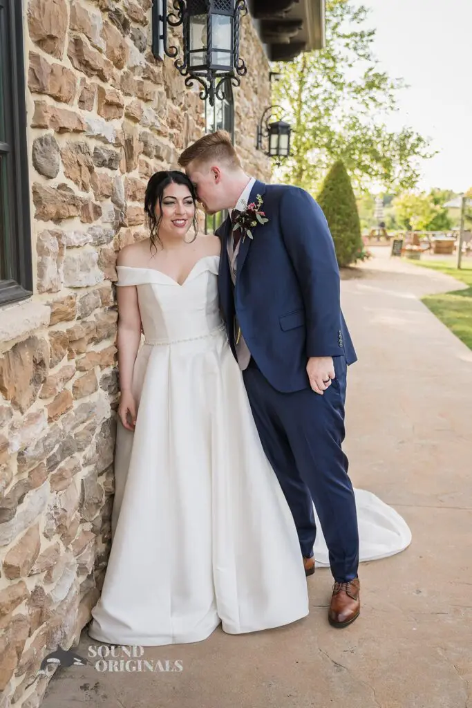 Groom leaning to the bride at Folino Estate Winery