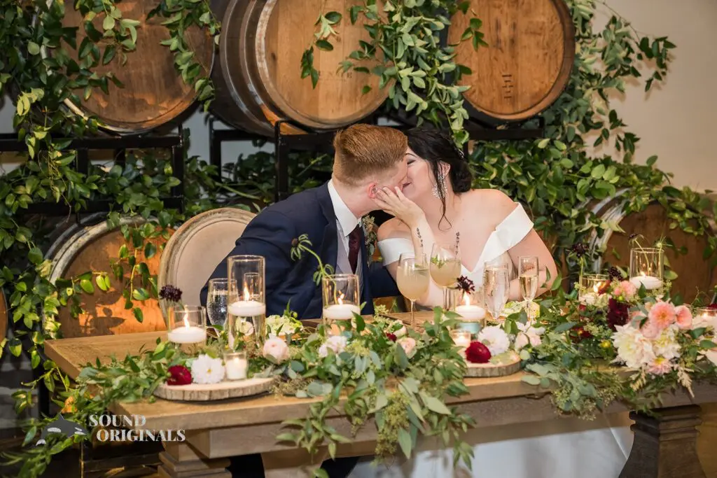 Intimate kiss of newlyweds at Folino Estate Winery