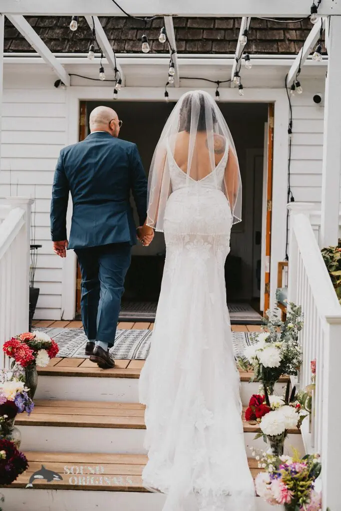 Husband and wife walk back to The Carey Gardens lodge