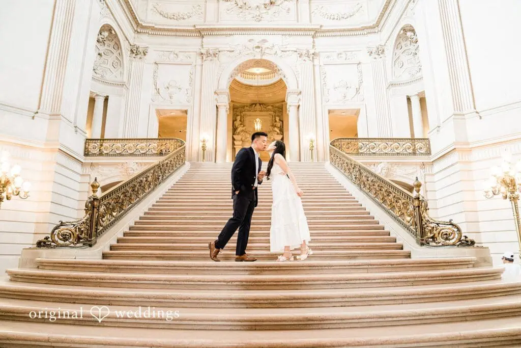 Engagement photo at San Francisco City Hall, one of the 24 Best Places for Engagement Photos in San Francisco, captured by our San Francisco wedding photography & videography team.