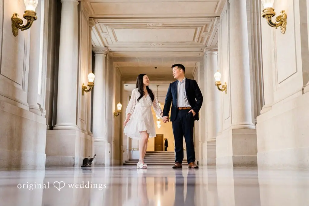 Engagement photo at San Francisco City Hall, one of the 24 Best Places for Engagement Photos in San Francisco, captured by our San Francisco wedding photography & videography team.