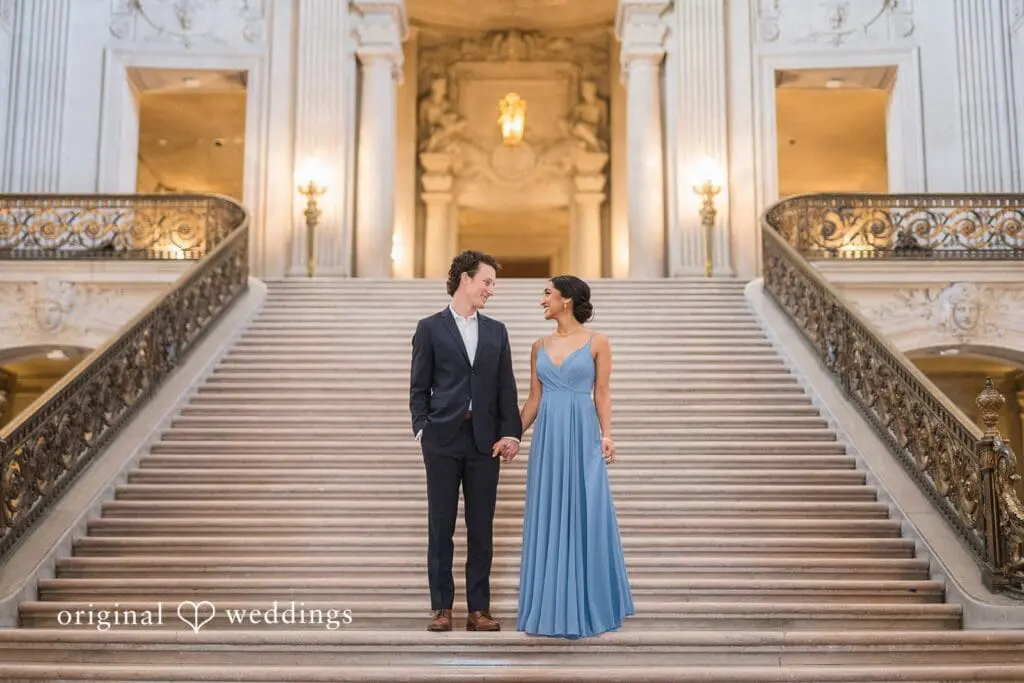 Engagement photo at San Francisco City Hall, one of the 24 Best Places for Engagement Photos in San Francisco, captured by our San Francisco wedding photography & videography team.