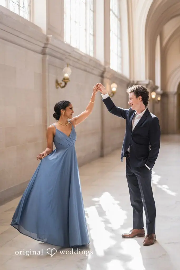Engagement photo at San Francisco City Hall, one of the 24 Best Places for Engagement Photos in San Francisco, captured by our San Francisco wedding photography & videography team.