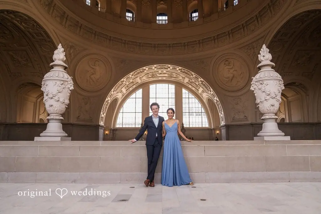 Engagement photo at San Francisco City Hall, one of the 24 Best Places for Engagement Photos in San Francisco, captured by our San Francisco wedding photography & videography team.