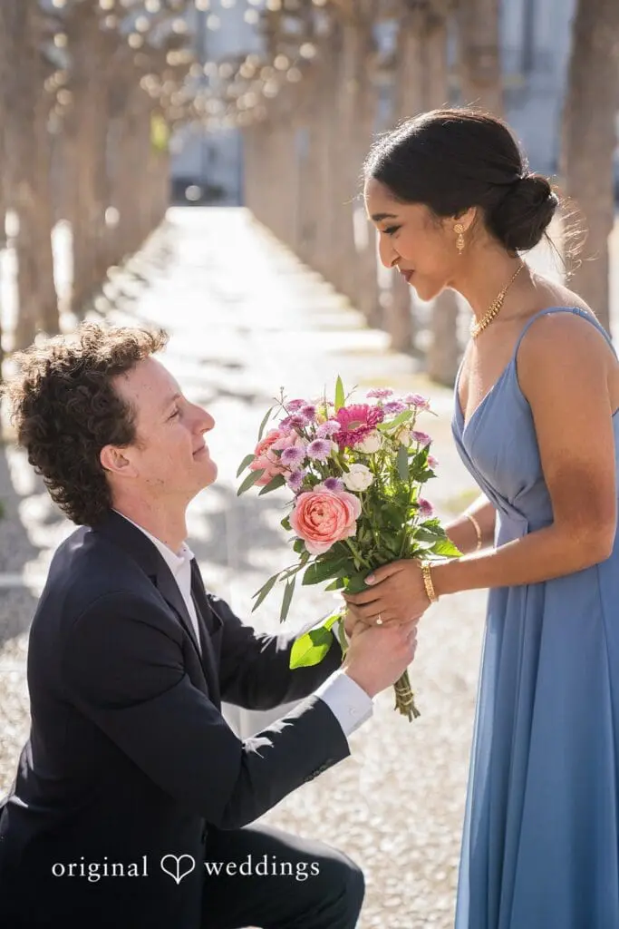Engagement photo at San Francisco City Hall, one of the 24 Best Places for Engagement Photos in San Francisco, captured by our San Francisco wedding photography & videography team.