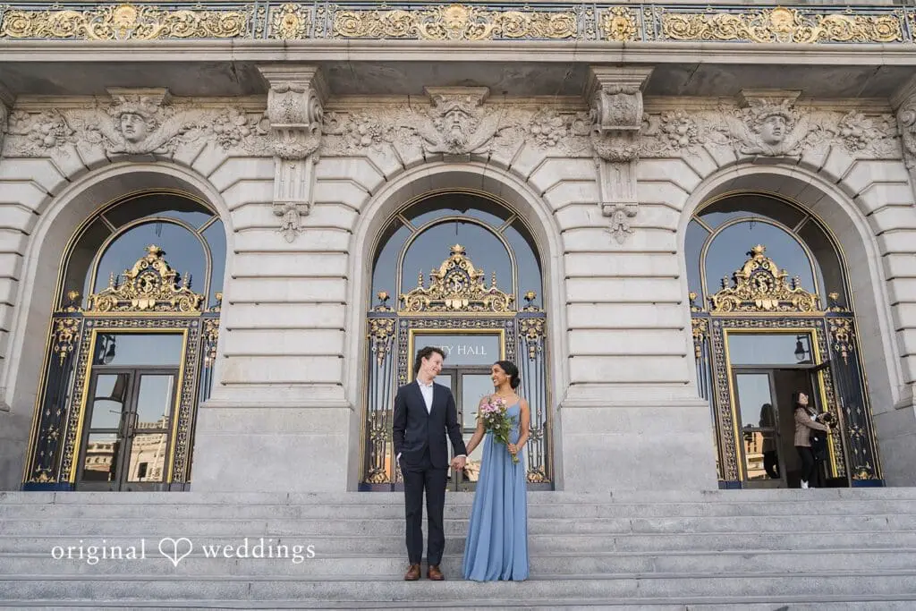 Engagement photo at San Francisco City Hall, one of the 24 Best Places for Engagement Photos in San Francisco, captured by our San Francisco wedding photography & videography team.