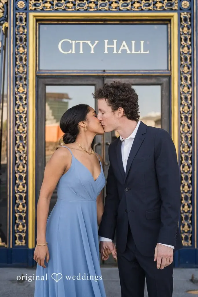 Engagement photo at San Francisco City Hall, one of the 24 Best Places for Engagement Photos in San Francisco, captured by our San Francisco wedding photography & videography team.