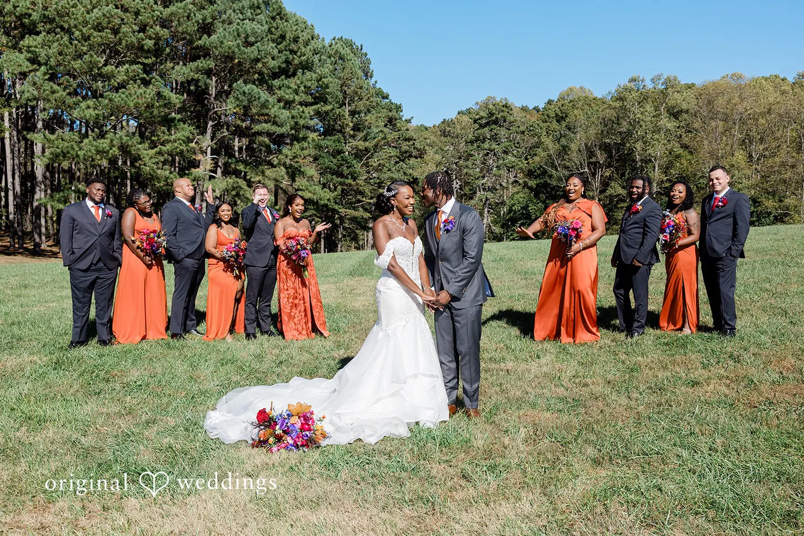 Jeremy + Jaida swan lake overlook fall wedding photos with lakeside scenery rustic tones and open natural landscapes