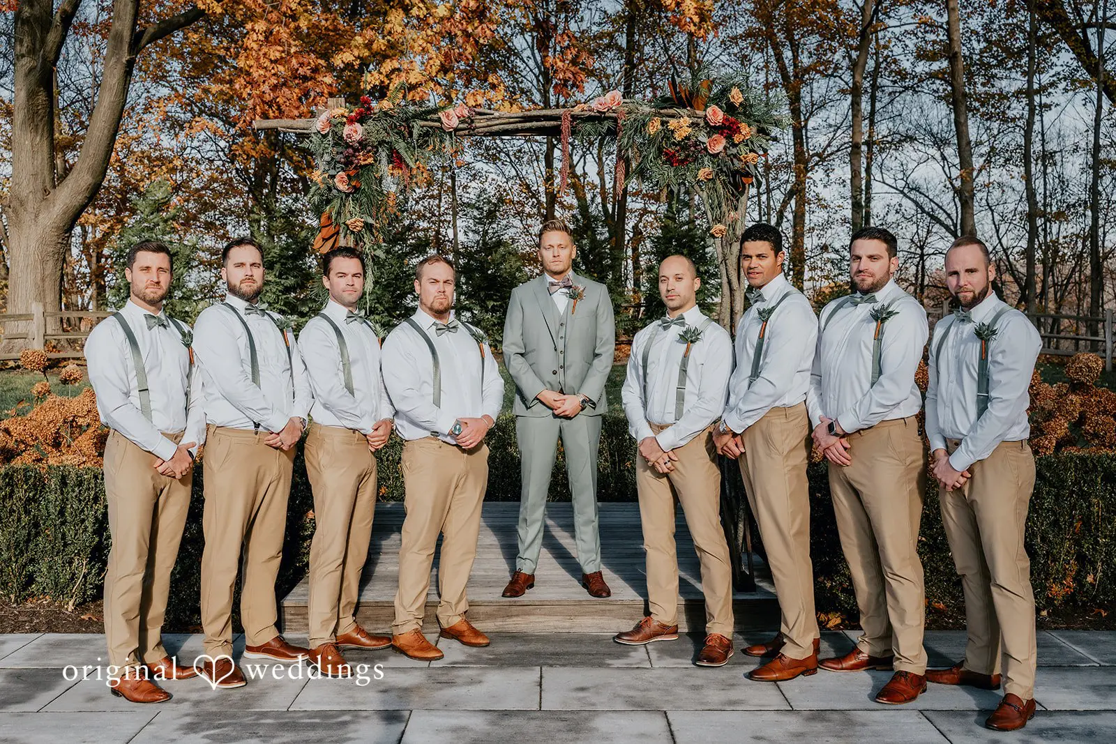 Kamaria + Chris A portrait of the groom with his groomsmen