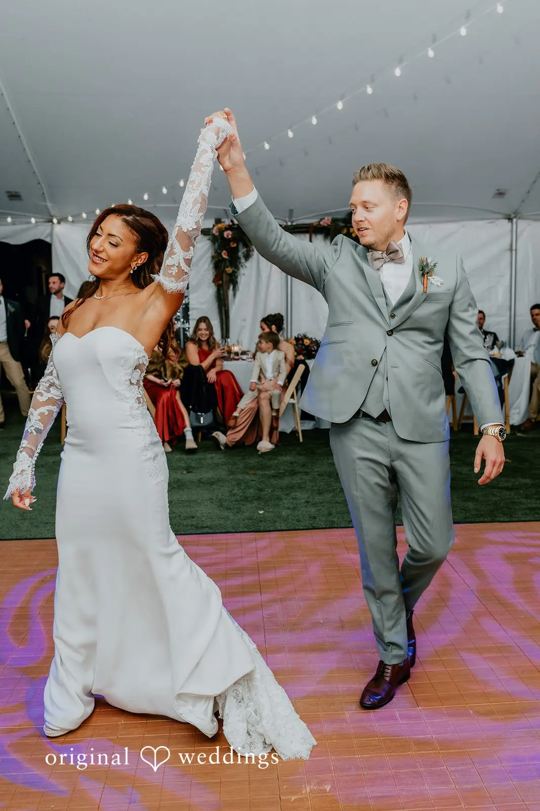 Kamaria + Chris The bride and groom having their first dance at the wedding reception