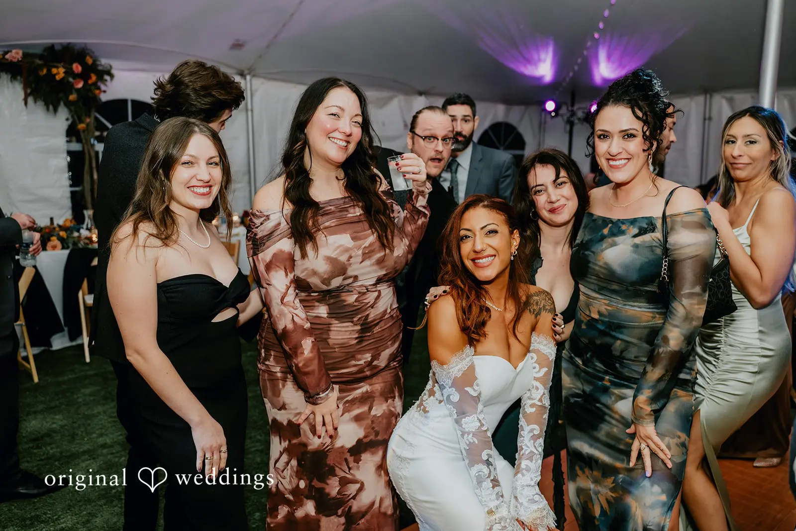 Kamaria + Chris A portrait of the bride with her friends