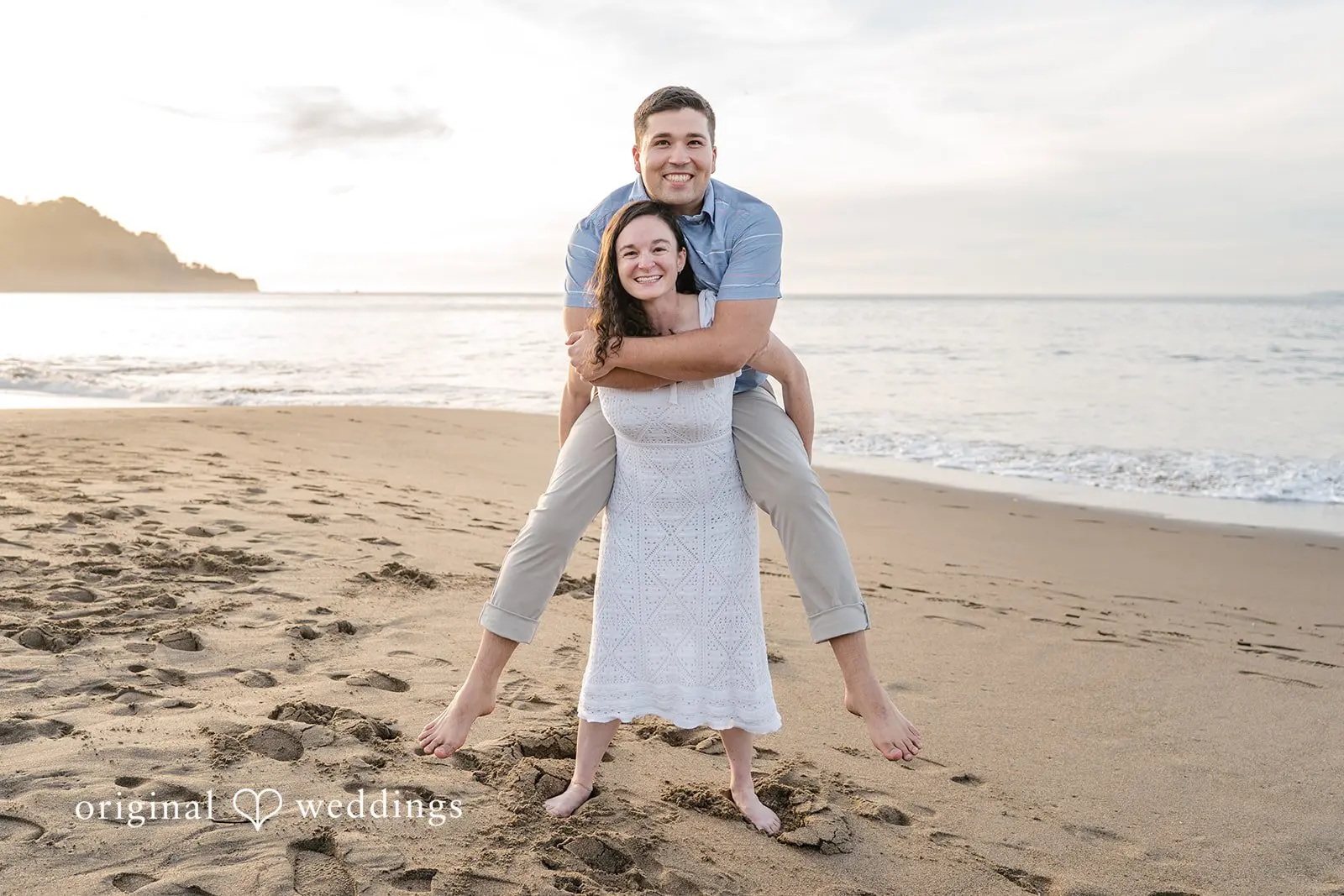 Daniel + Karen A fun portrait of Karen backing Daniel at Baker Beach