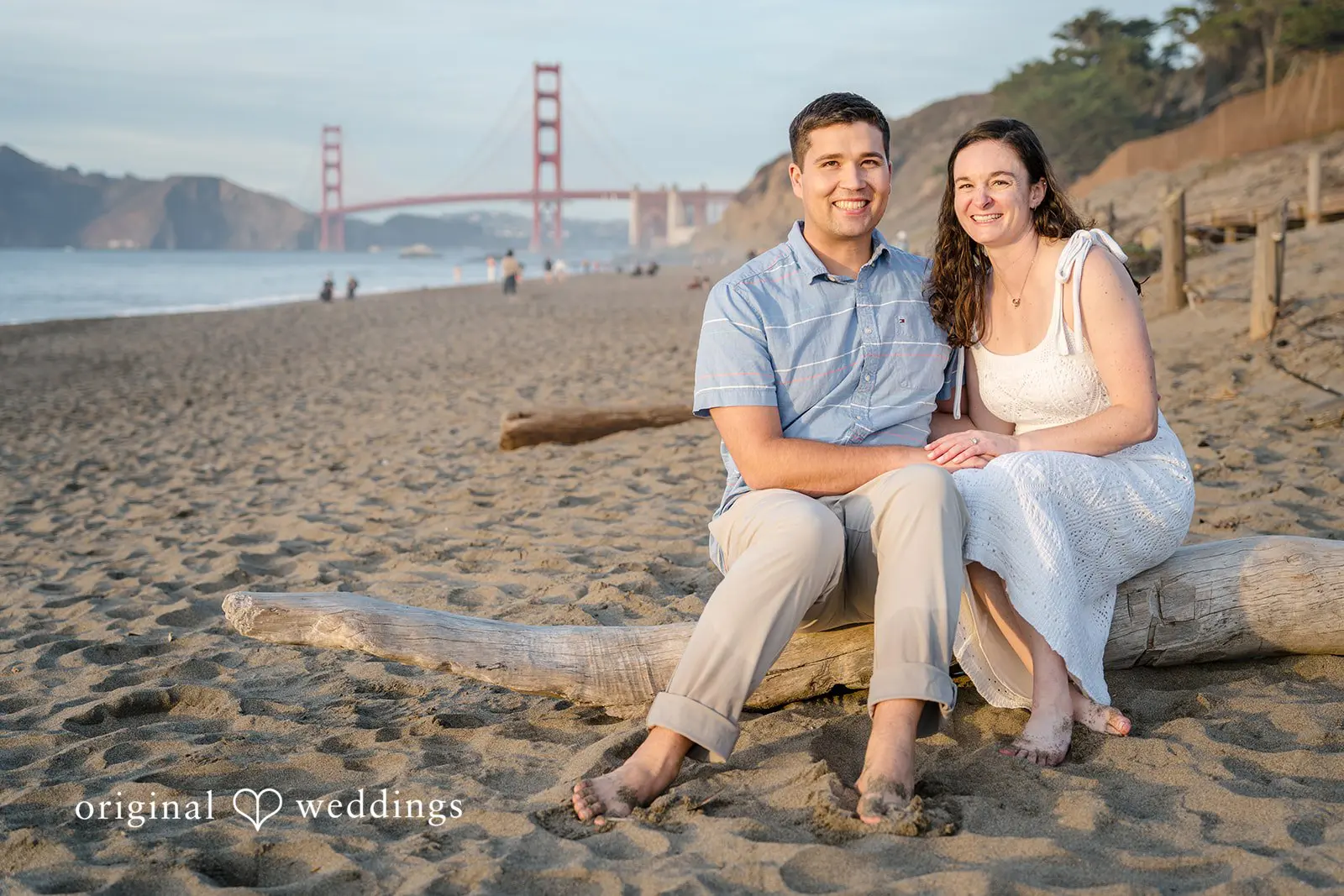Daniel + Karen A happy portrait of the couple by the beachside