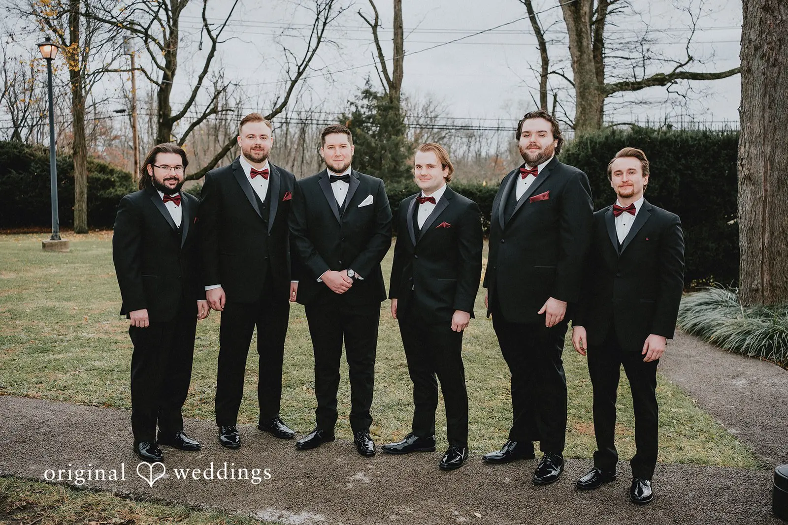 Stephanie + Zachary A portrait of the groom and the groomsmen