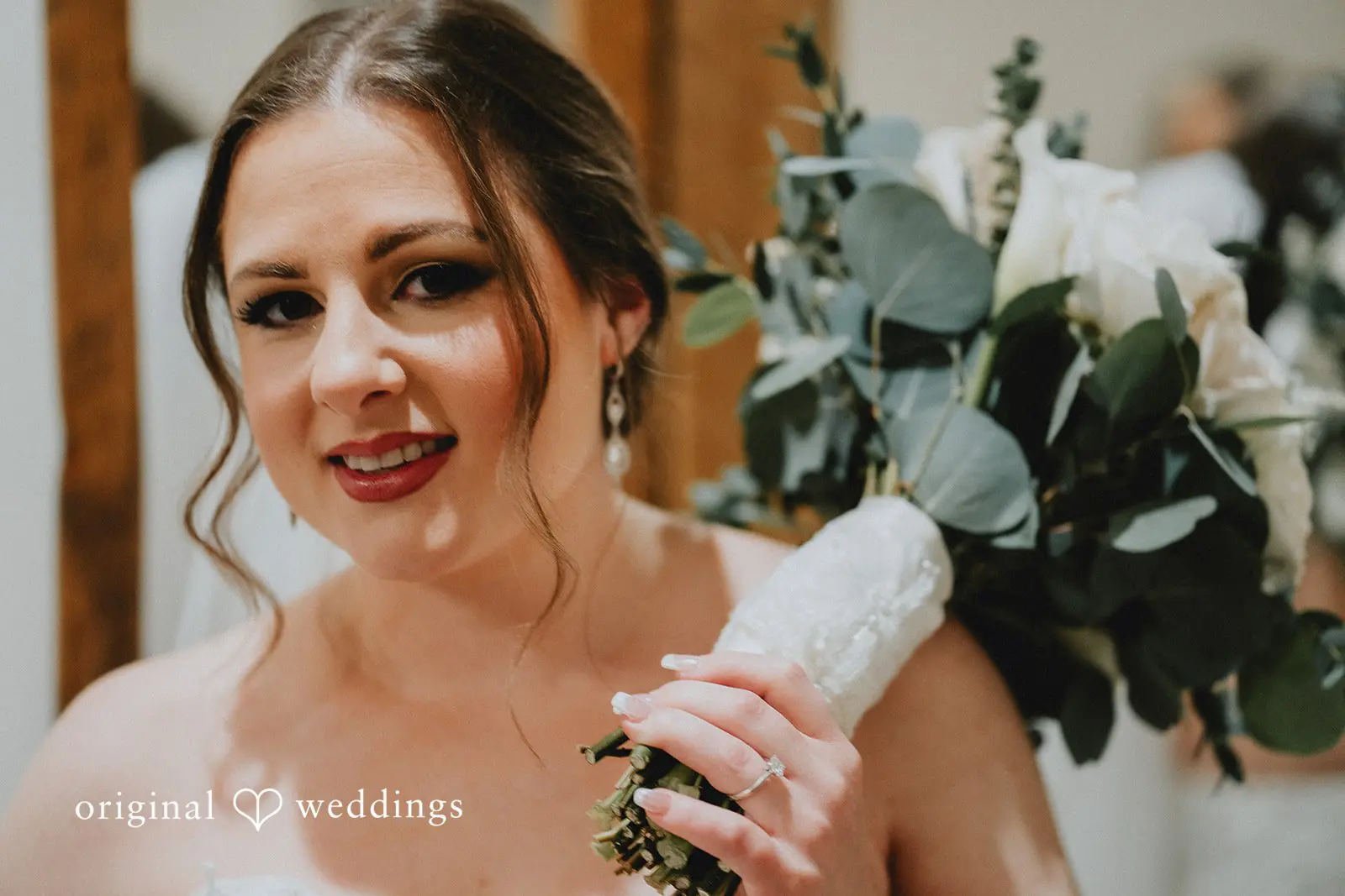Stephanie + Zachary The bride holding her bouquet