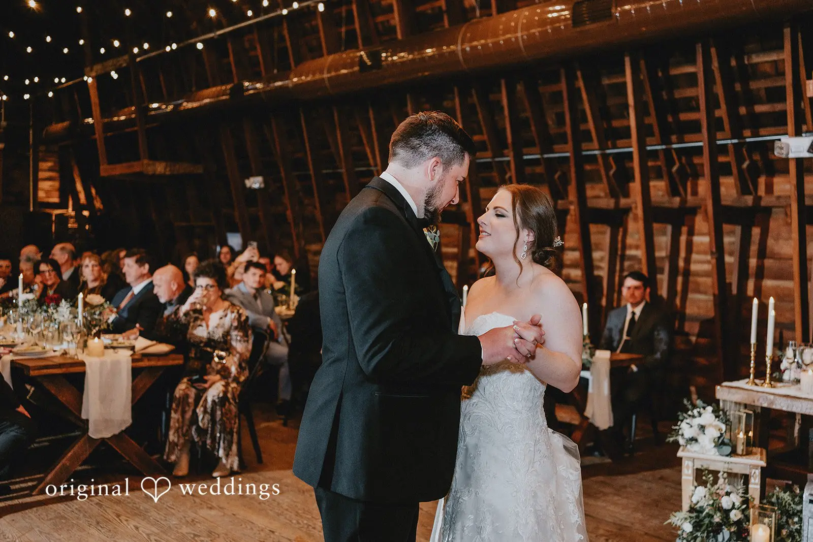 Stephanie + Zachary Romantic moment of the bride and groom at the wedding reception