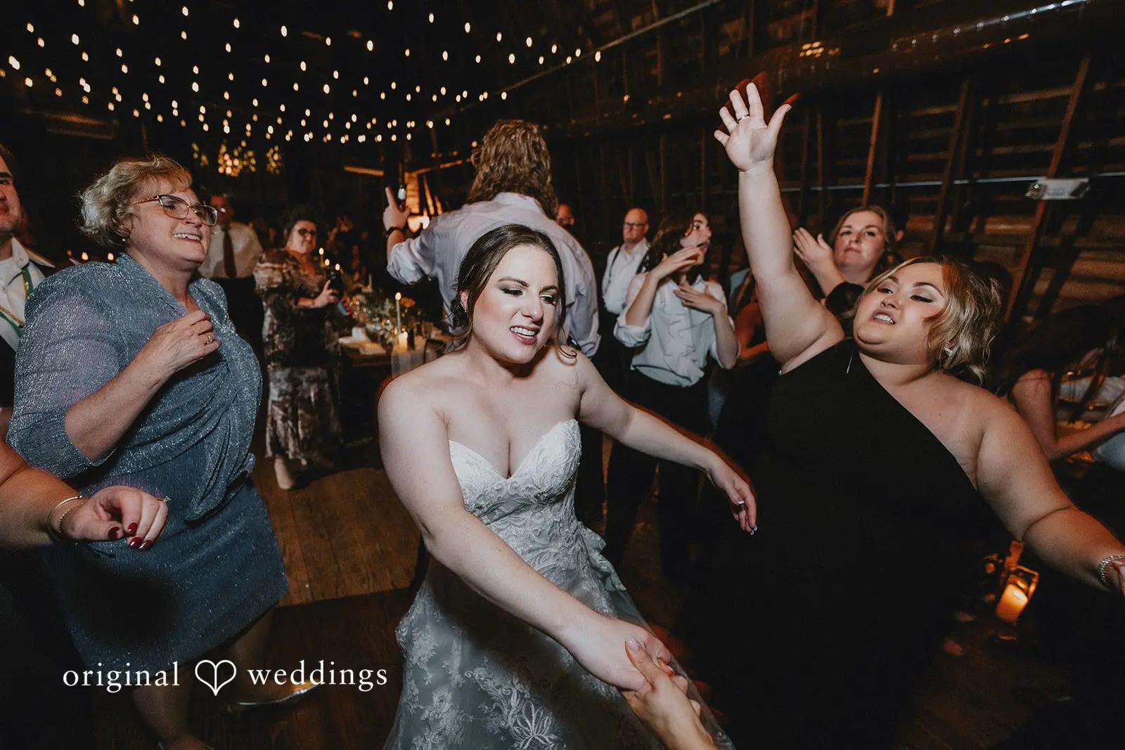 Stephanie + Zachary Dance time between the bride and happy guests