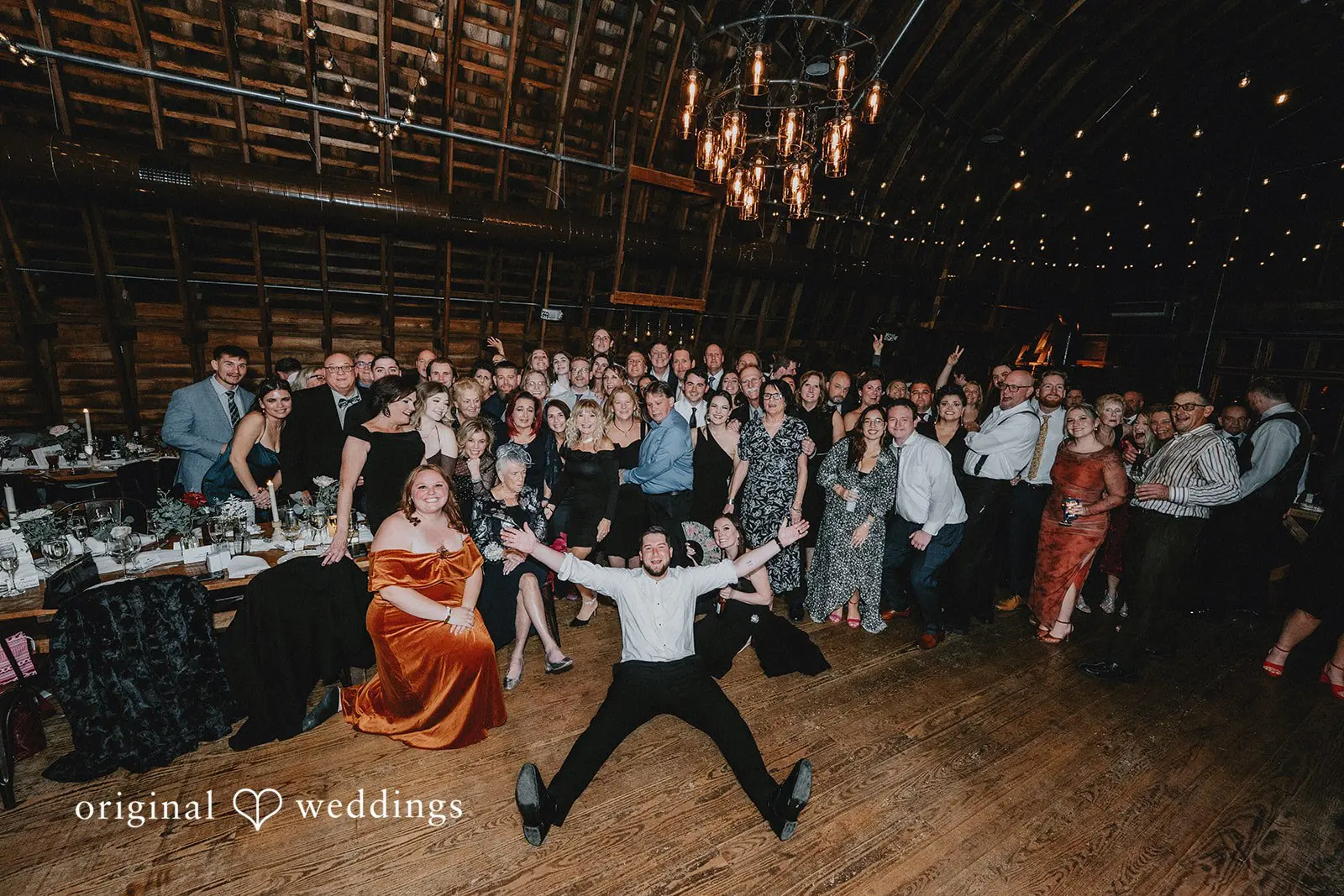 Stephanie + Zachary Our Philadelphia wedding photographer took a fun photo of the groom and the wedding party after the wedding reception