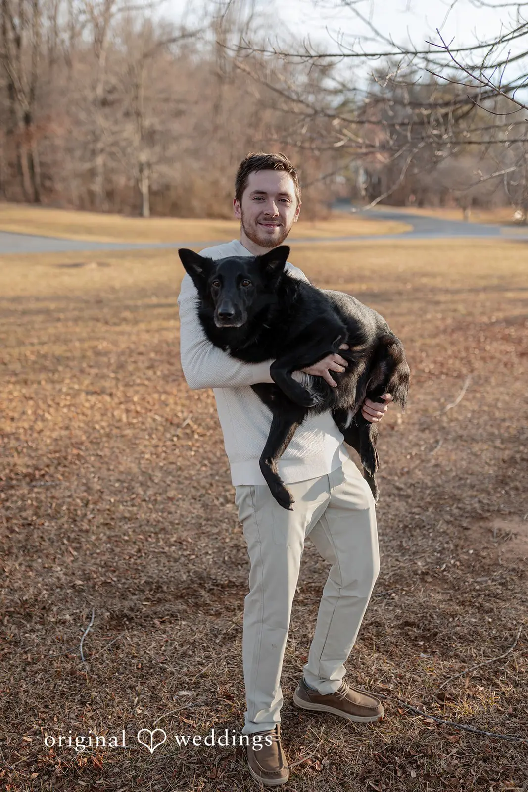 Rosemary + James A portrait of the groom with one of his pups
