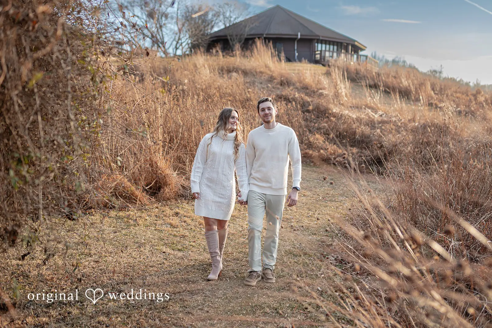 Rosemary + James Our Washington DC wedding photographer at Original Weddings captured a romantic portrait of the couple taking a walk at Black Hill Regional Park