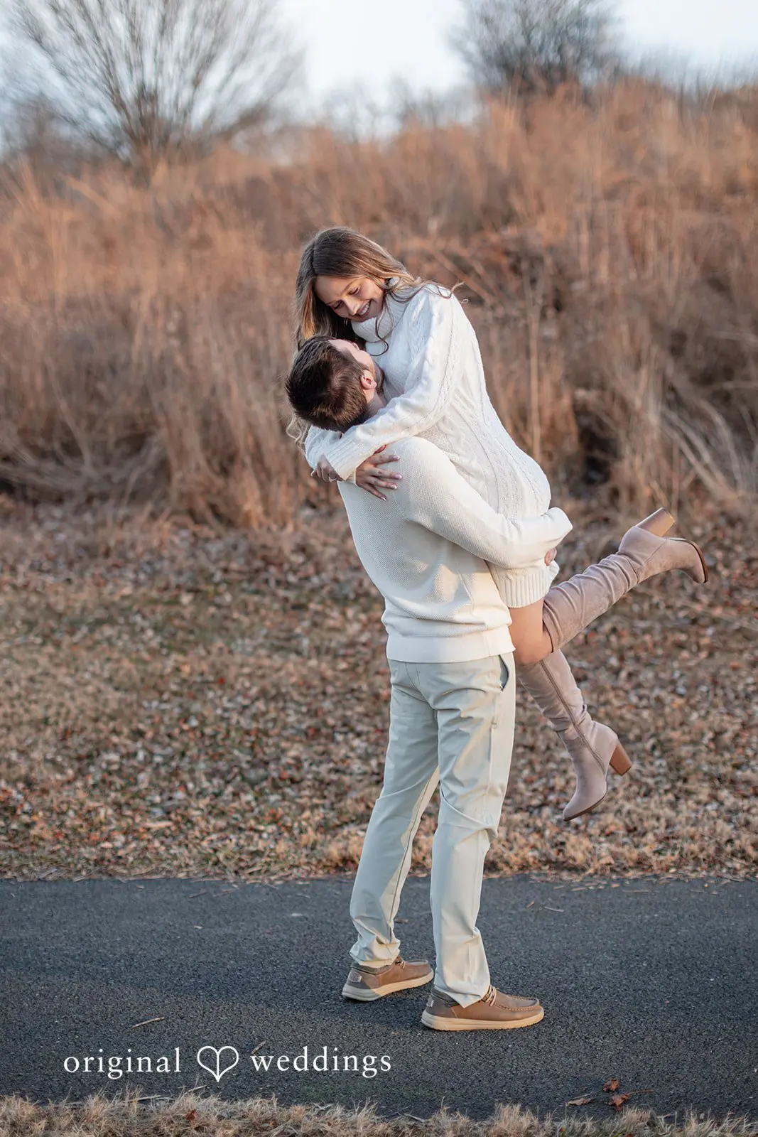 Rosemary + James Our Washington DC wedding photographer captured the beautiful moment the groom lifted the bride up at Black Hill Regional Park