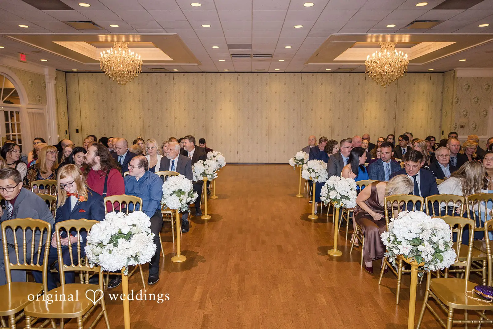 Seated guests awaiting the start of the wedding ceremony at the Buck Hotel