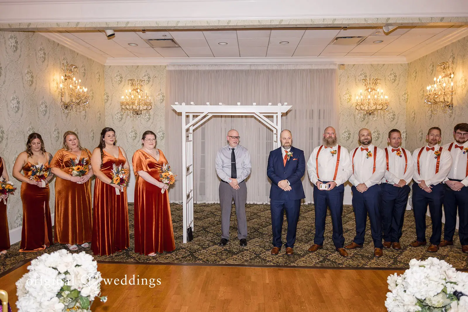 The groom awaits the entrance of the bride at the wedding ceremony
