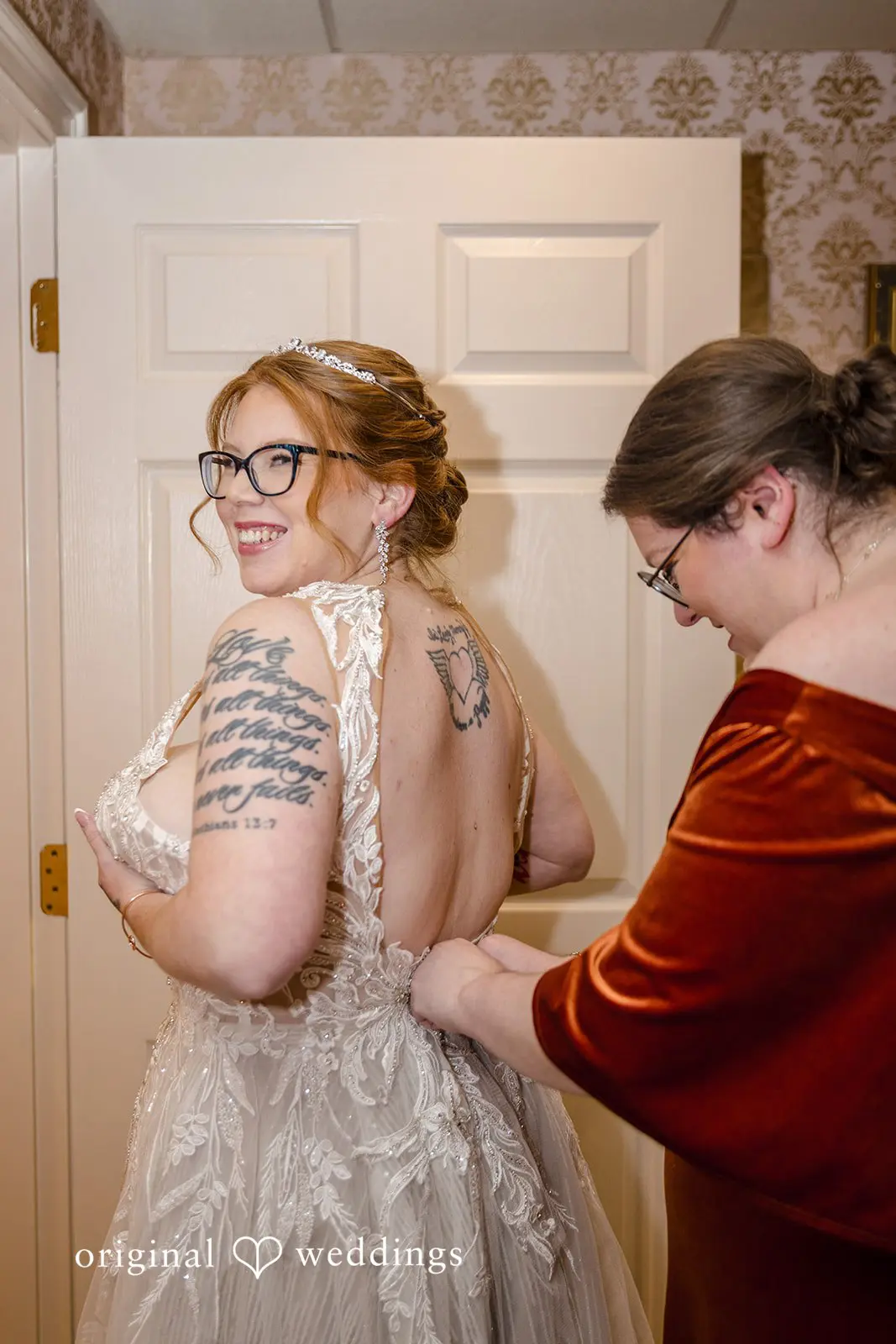 The happy getting-ready moment of the bride before the wedding ceremony