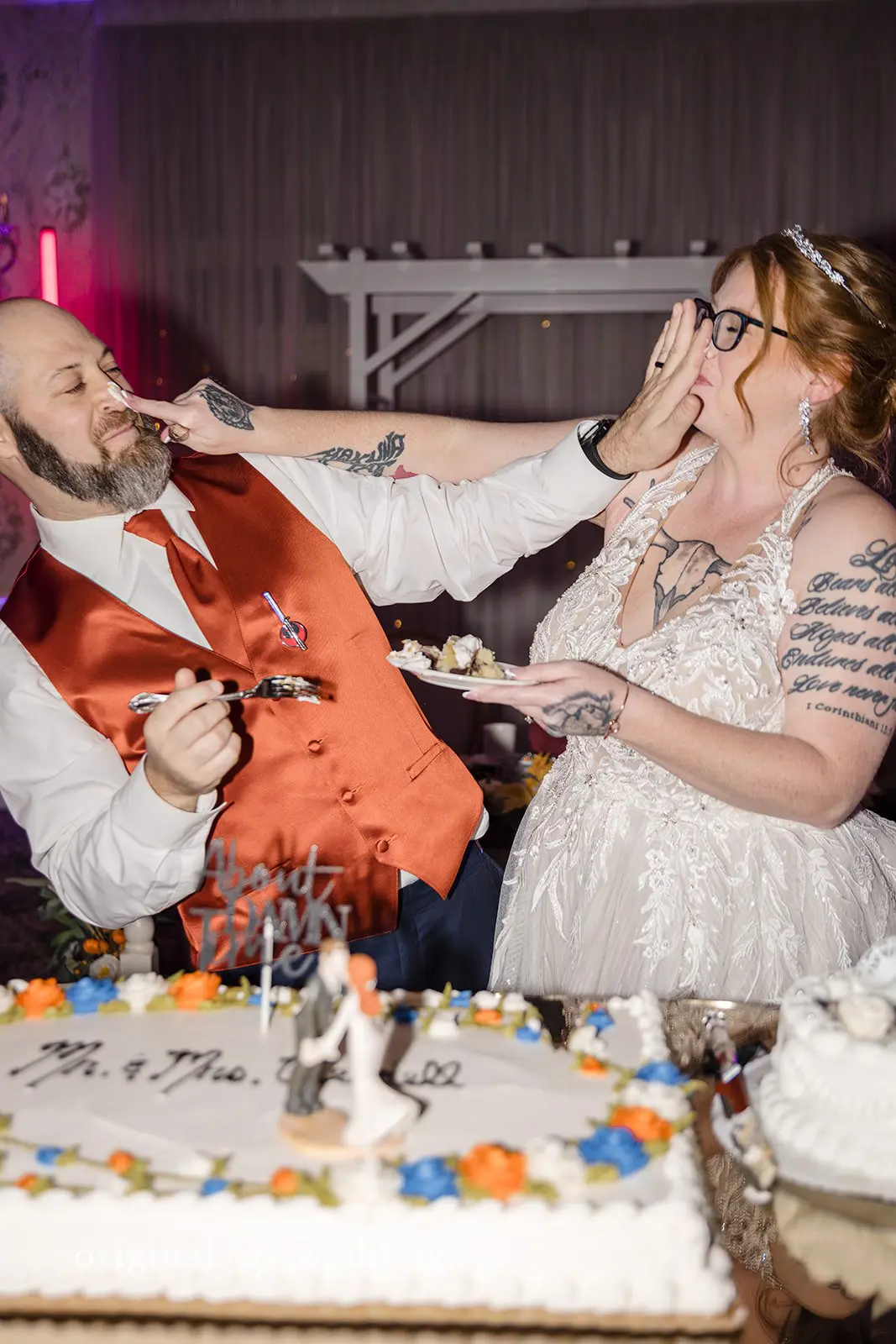 Fun moment of the bride and groom at their reception