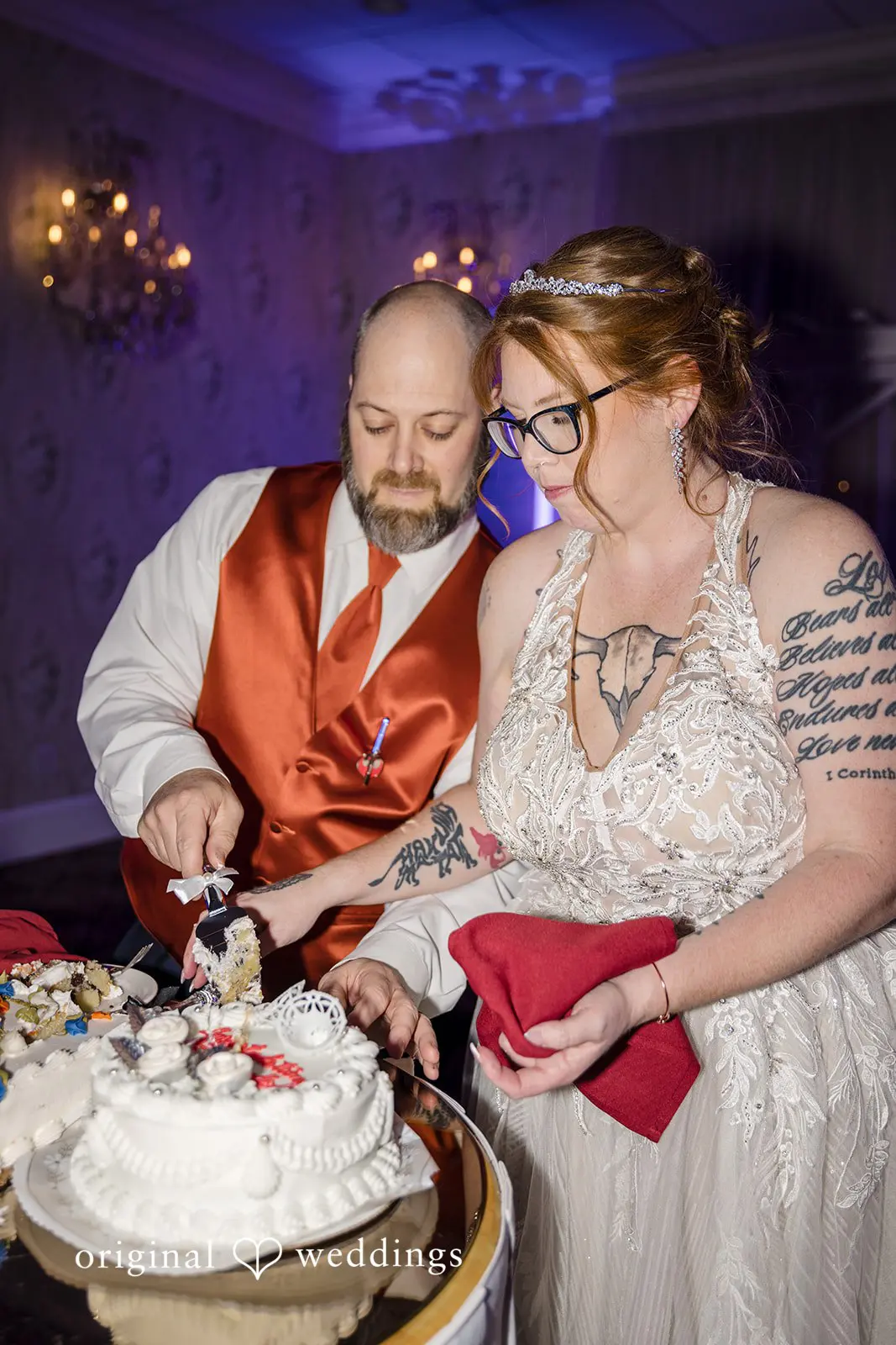The moment the bride and groom cut their wedding cake