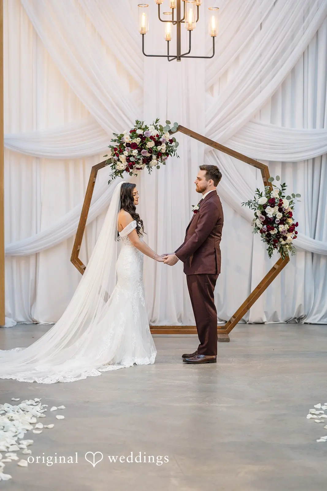 A photo of the bride and groom about to exchange marital vows