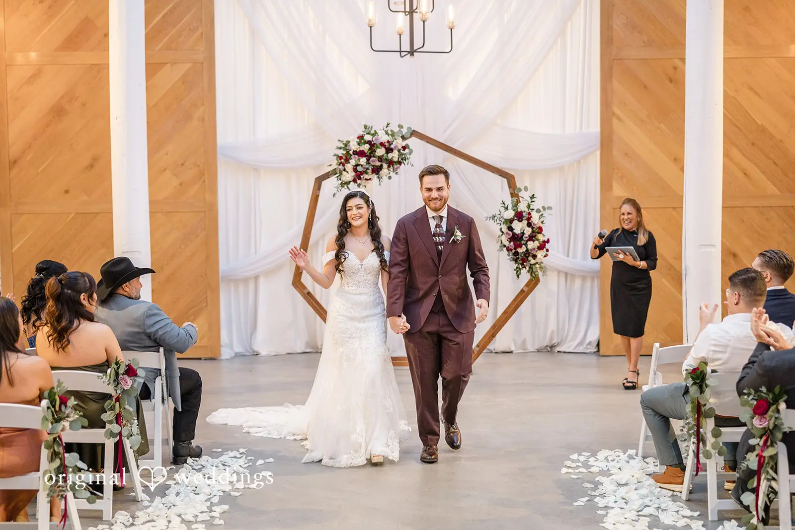 A happy exit of the couple after their wedding ceremony