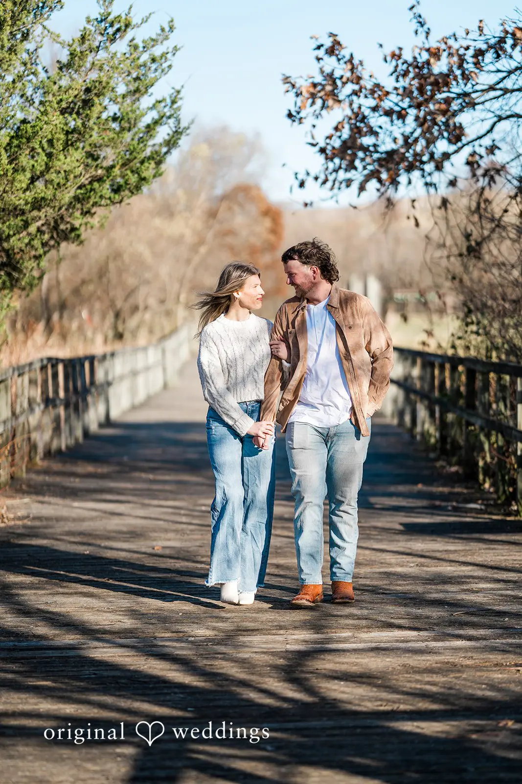 A romantic portrait of the couple taking a walk at Crosswind Marshes