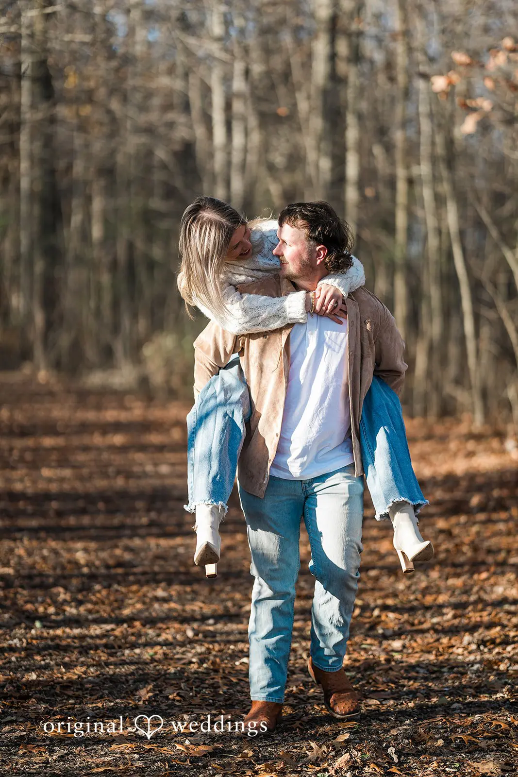A romantic portrait of the groom backing the bride