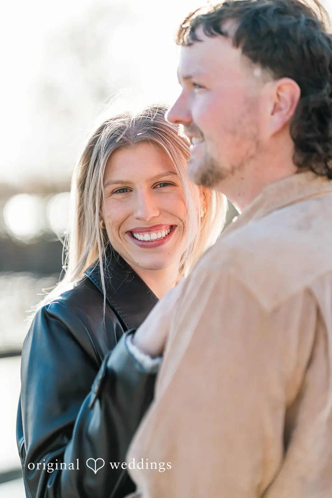 A happy portrait of the couple captured by our Detroit wedding photographer