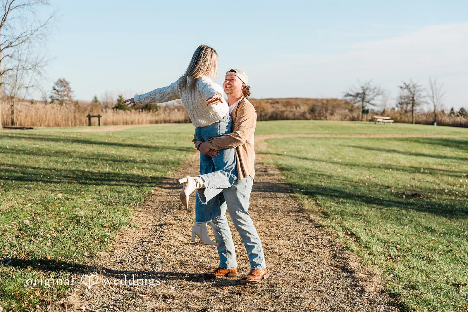 A fun portrait of the couple in Crosswind Marshes' wide field