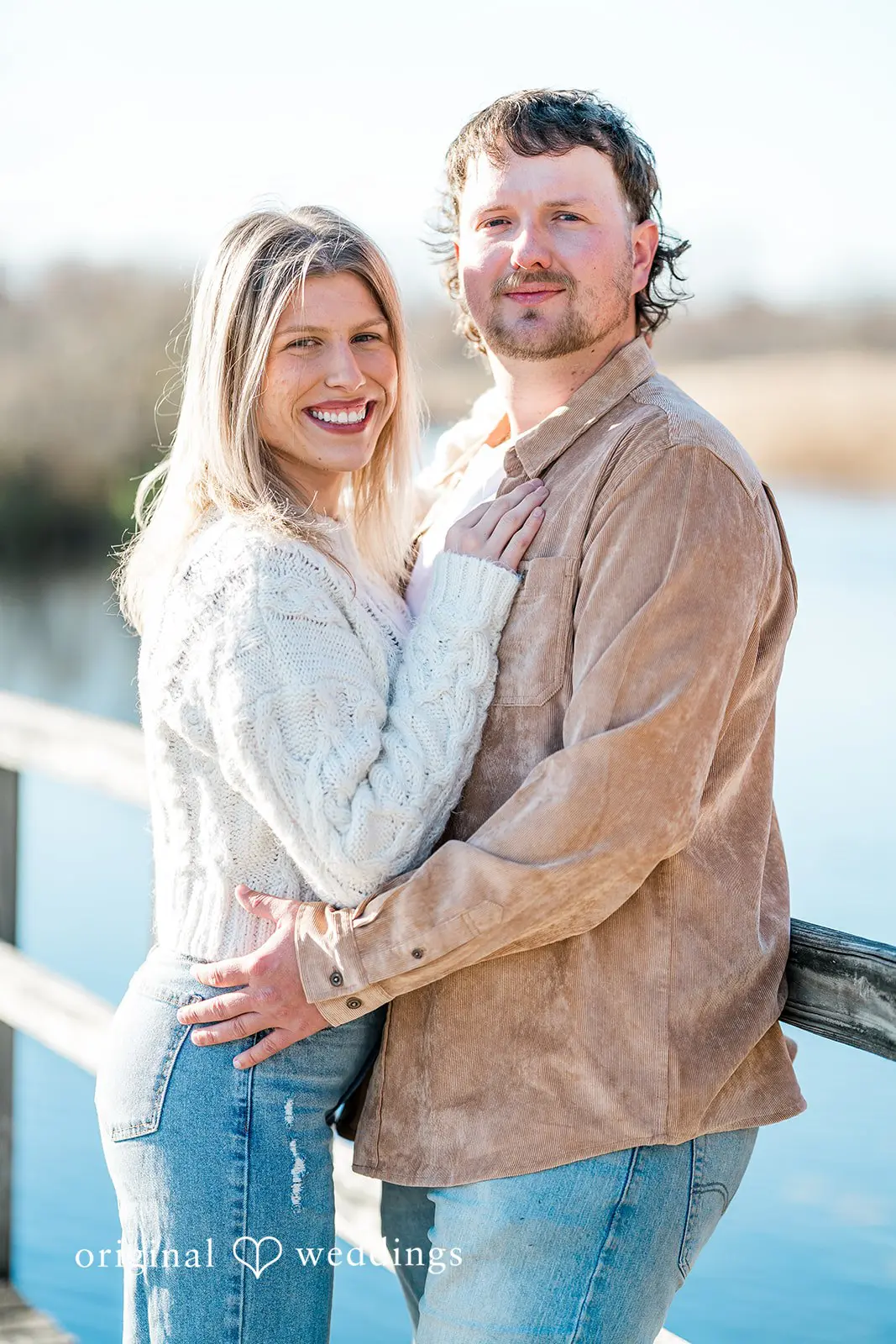 A portrait of the couple on the trails of Crosswind Marshes