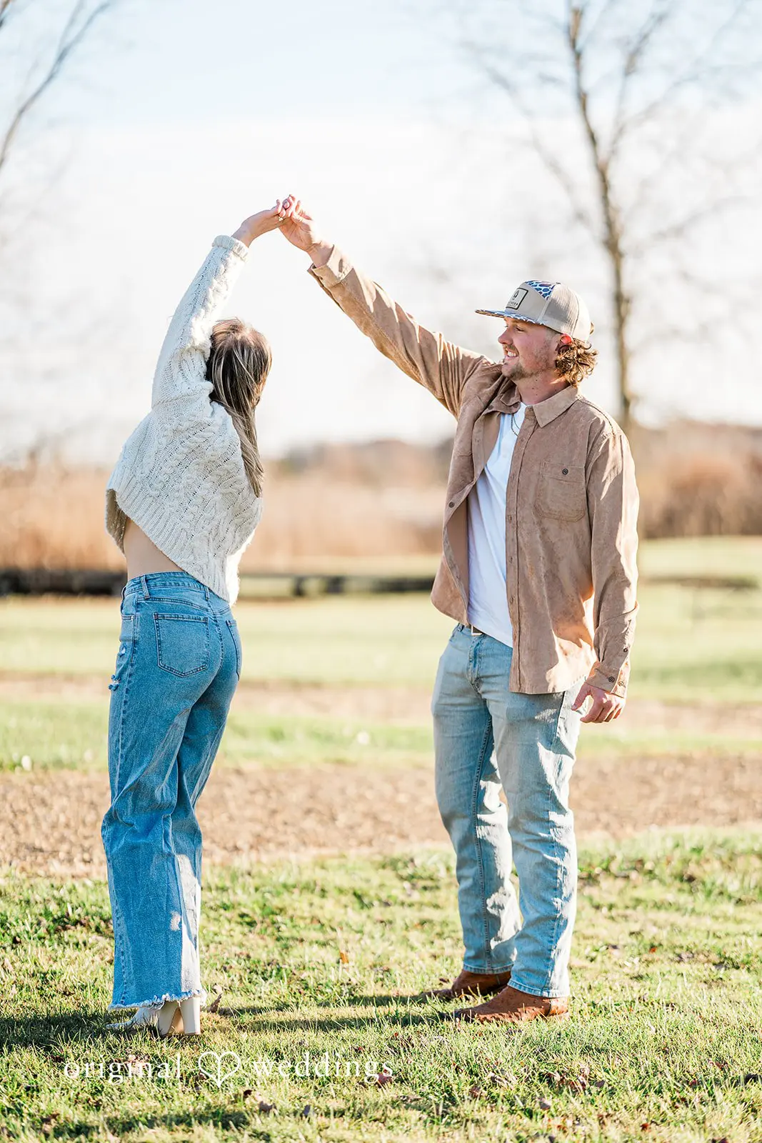 The couple having a fun time at Crosswind Marshes' field