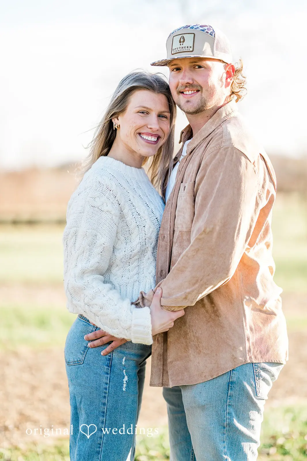 Our Detroit wedding photographer captured a beautiful portrait of the couple in the field