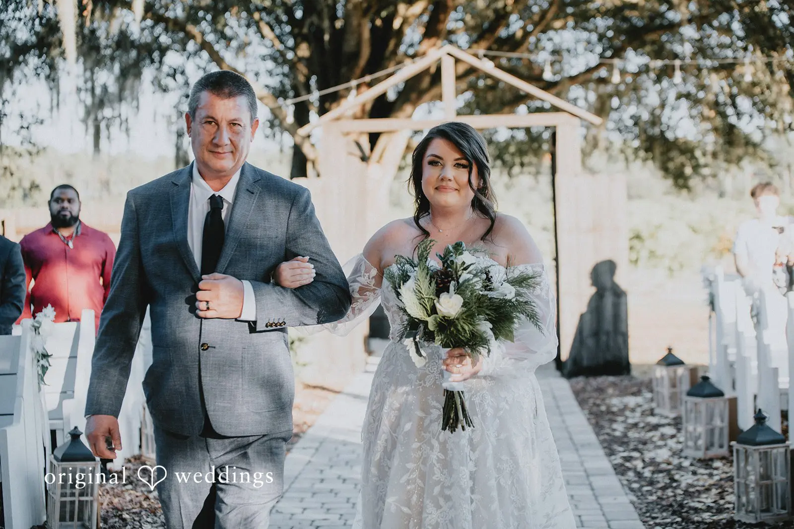 Marisa + Jessica The bride's father escorting her down the aisle