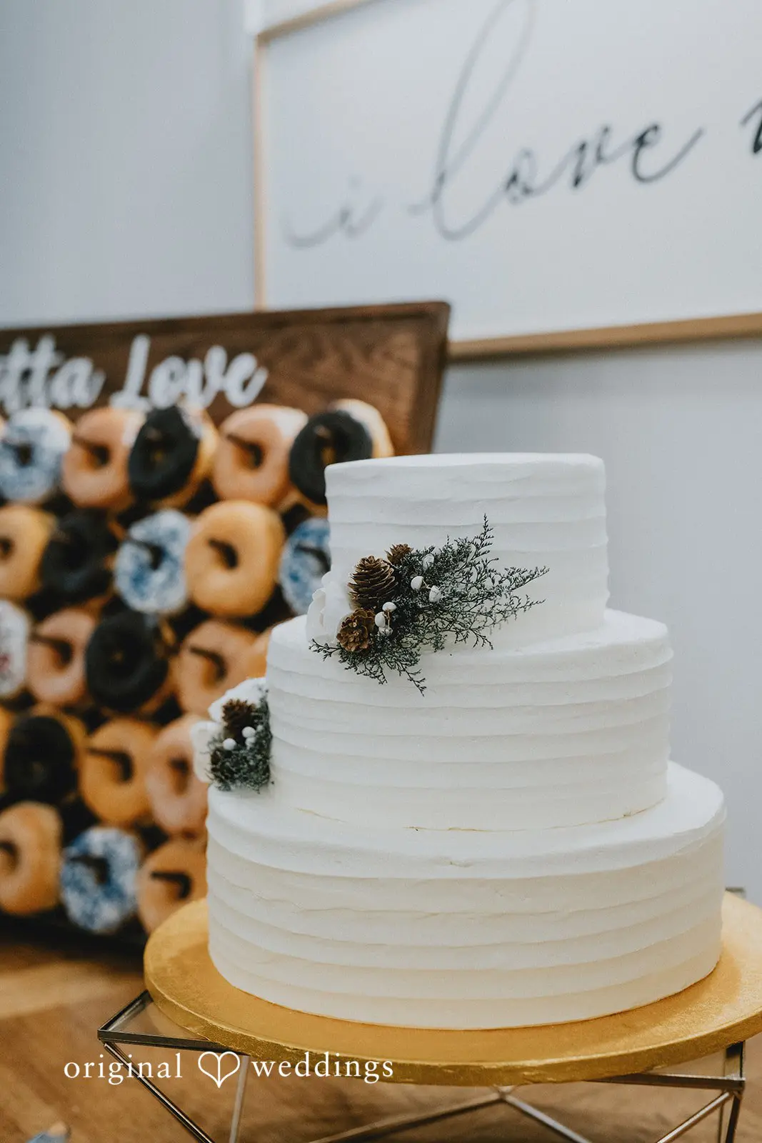 Marisa + Jessica An all-white wedding cake at Ever After Farms Citrus wedding reception