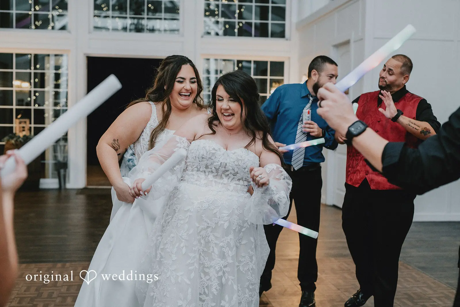 Marisa + Jessica The couple all joyful after their wedding reception
