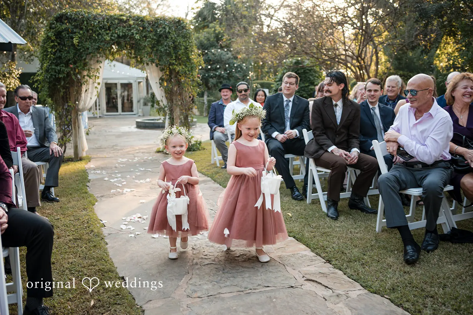 Ashley + David The flower girls at the Hummingbird House wedding ceremony