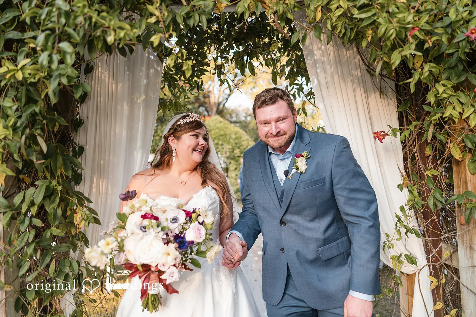 Ashley + David A joyful photo of the bride and groom after their wedding ceremony