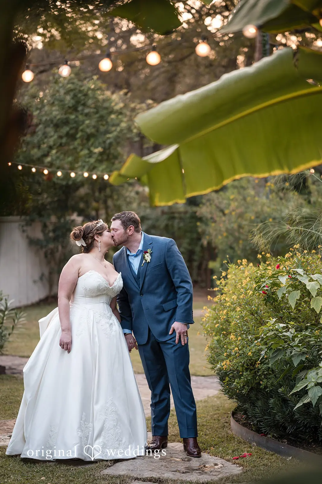 Ashley + David A romantic portrait of the bride and groom in Hummingbird House's outdoor area