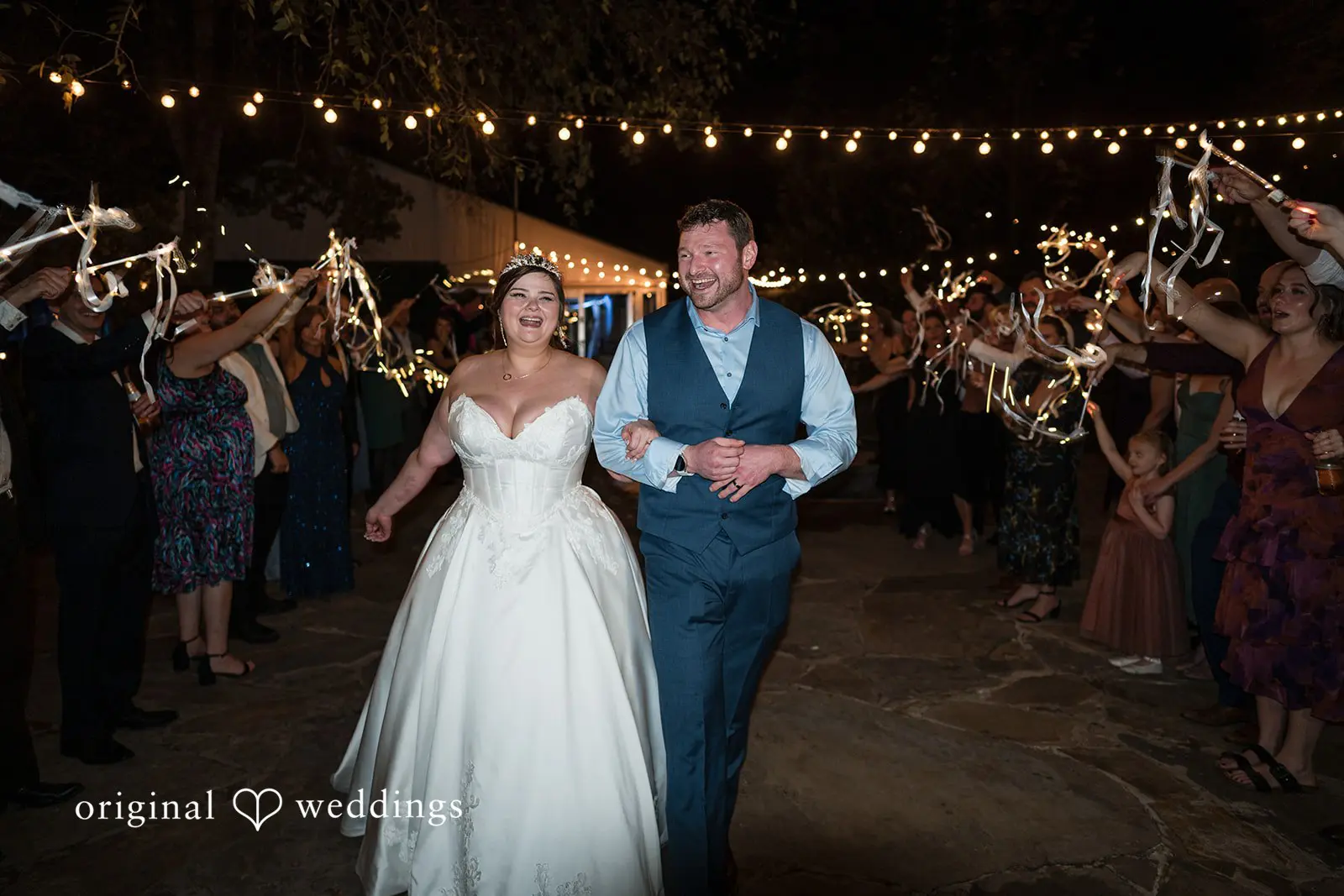 Ashley + David A grand exit of the couple after their wedding reception